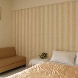 Zimmer mit Kingsize-Bett